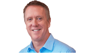 Professional headshot of a smiling business professional in a blue shirt